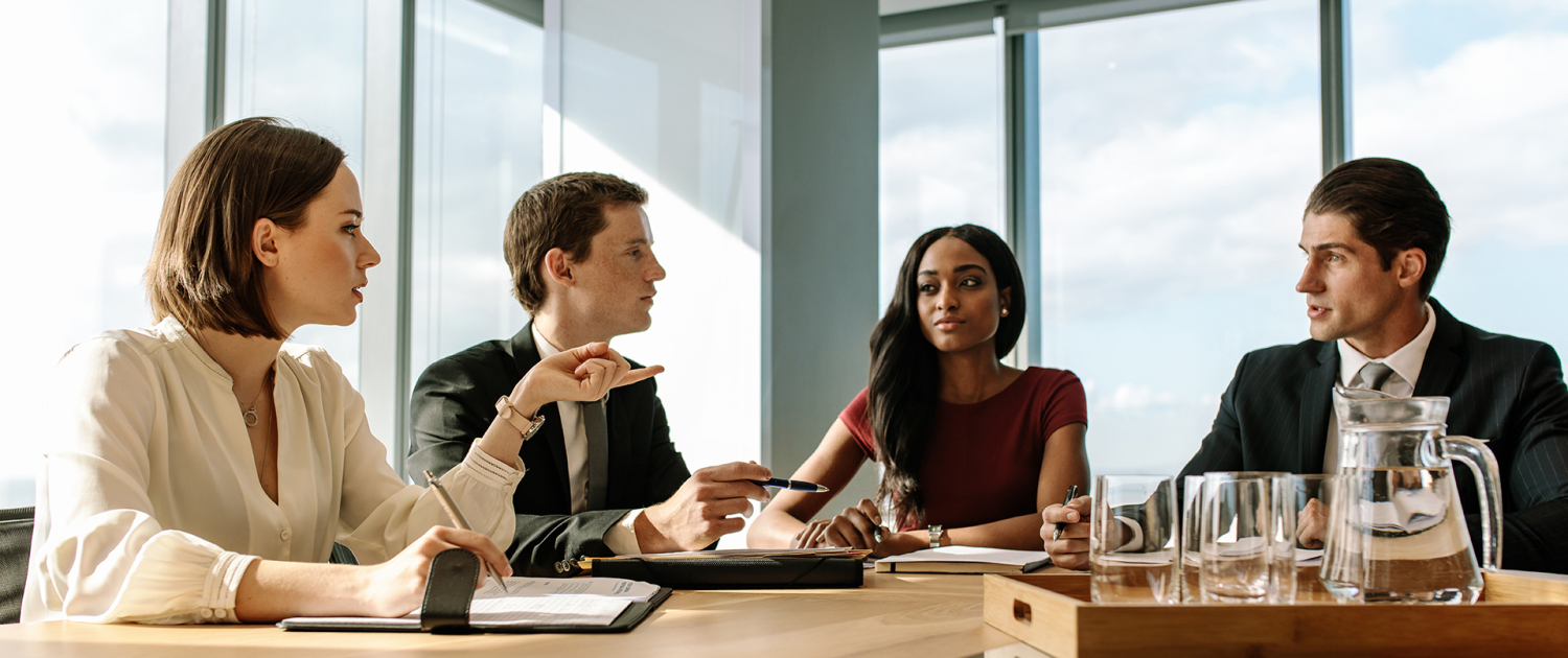 Group of business people meeting in board room